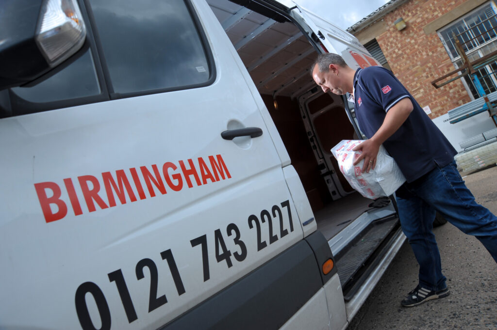 BEW employee putting in an order ready for delivery.