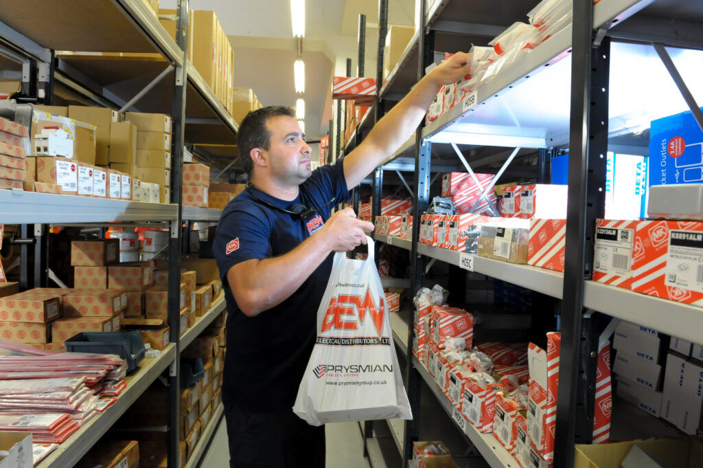 BEW employee picking an order in the BEW Farnborough warehouse