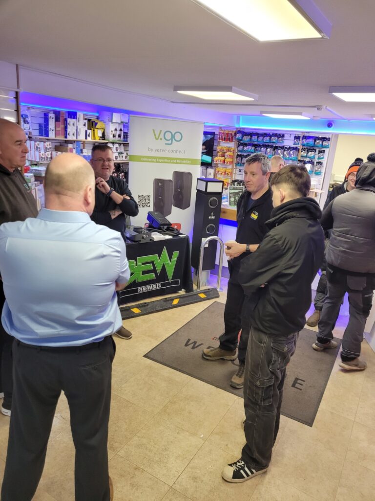 Customer standing and chatting at BEW Shrewsbury EV event
