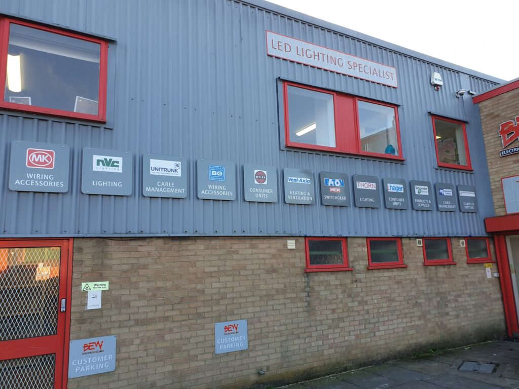Outside BEW Electrical Wholesalers Peterborough branch showing brands and items sold
