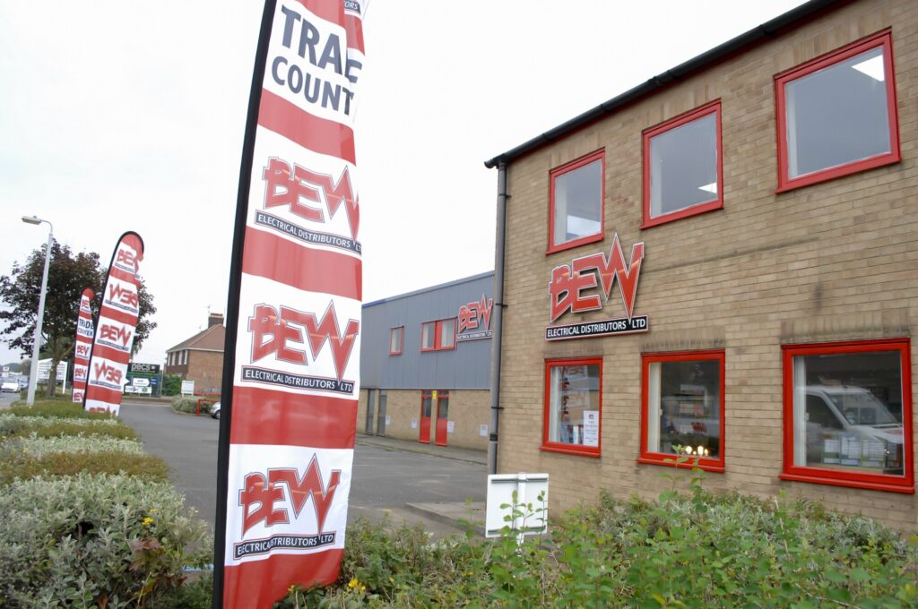 Outside of BEW Peterborough with display flags/banners